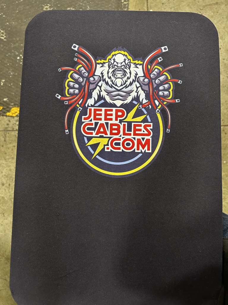 Vibrant t shirt printing of a yeti ripping out jeep cables